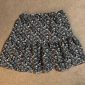 This is a large green floral mini skirt. I only ever wore it once.